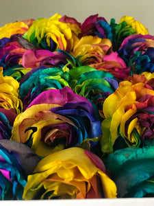 A close-up image of 24 rainbow from Vancouver's Box Des Fleurs in a Luxury Marble Box. The elegant white marble complements the rose's natural beauty. Perfect for a sophisticated and romantic gift or decoration. Order now for fresh, handcrafted flowers from Vancouver's premier florist.
