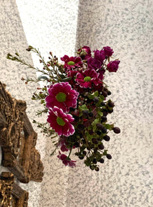 A collection of stunning flower arrangements from Vancouver's Box Des Fleurs, featuring a variety of colors and flowers, including pink and purple roses, white lilies, and greenery. The arrangements are presented in elegant clear glass vases and designed to add a touch of sophistication and beauty to any space. Order now for fresh, handcrafted flowers from Vancouver's premier florist.